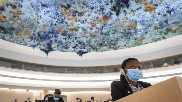A delegate from Angola looks on during the vote of a watered down resolution condemning structural racism and police brutality in the wake of the death of George Floyd at the United Nations Human Rights Council in Geneva, Switzerland - 19 June 2020.