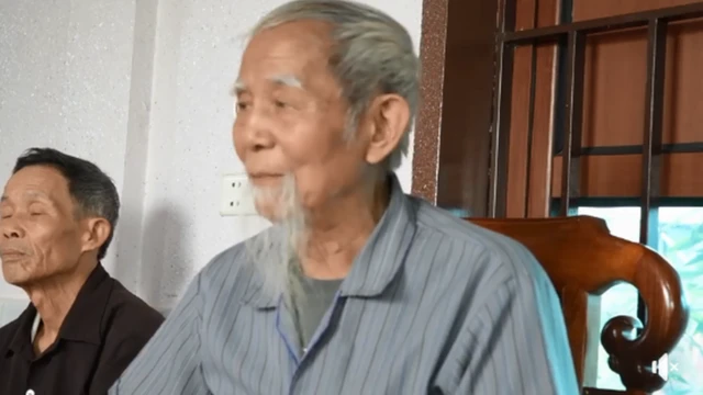 Ông Lê Đình Kình trong một buổi họp về đất đai với người dân Đồng Tâm năm 2019