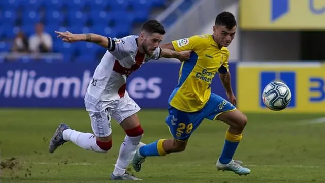 Pedri (r) making his professional debut for Las Palmas in August 2019 in a second tier defeat by Huesca
