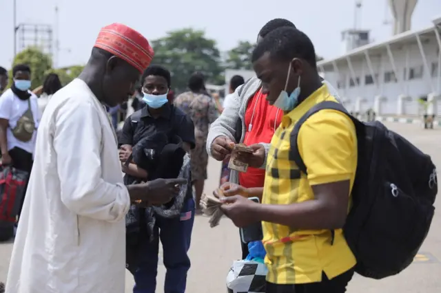 Returnees wey dey live outside Abuja receive hundred dollars as transport money go dia various destinations.