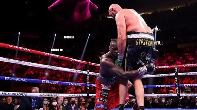 Tyson Fury knocks down Deontay Wilder for a second time