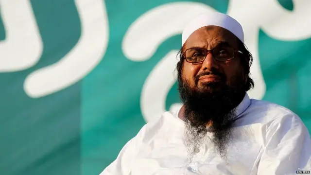 Hafiz Muhammad Saeed, chief of the banned Islamic charity Jamaat-ud-Dawa, looks over the crowed as they end a "Kashmir Caravan" from Lahore with a protest in Islamabad, Pakistan on 20 July 2016