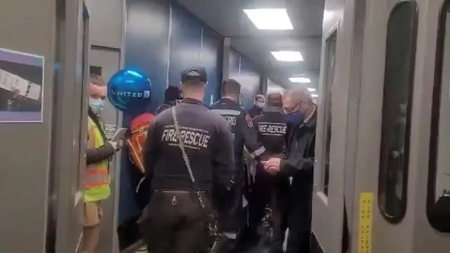 Paramedics meet de flight on arrival upon landing for Dulles international airport