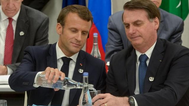 O presidente Jair Bolsonaro e o líder francês, Emmanuel Macron, durante reunião no G20como apostar mr jack bet2019