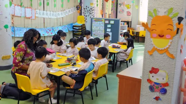 Singapore students in a reading lesson
