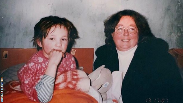 Oksana Masters as a child, with her adoptive mother