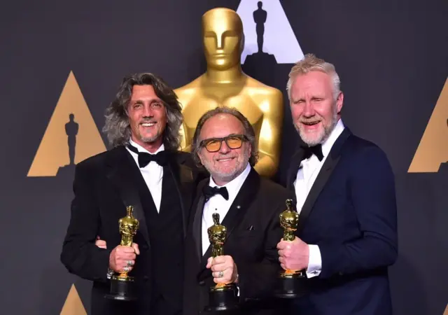 Alessandro Bertolazzi (ortada), Giorgio Gregorini (sol) ve Christopher Nelson (sağ)