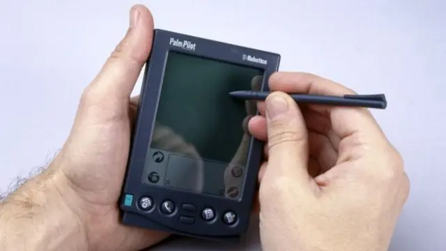 Palm tiny smart phone