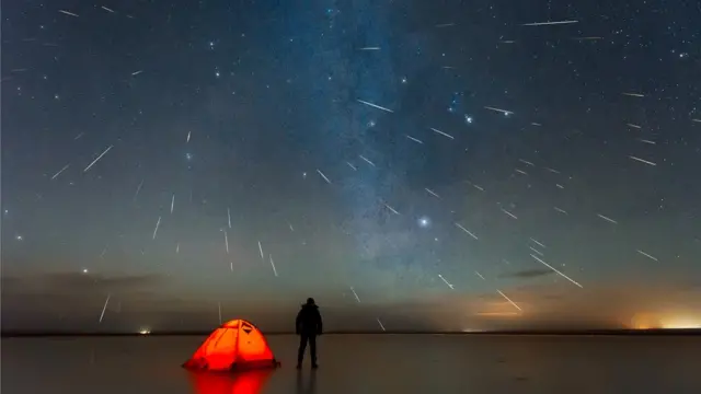 Chuvapixbet atualizoumeteoros Geminídeas vistopixbet atualizoulago na China e observada por homem pertopixbet atualizoubarracapixbet atualizouacampar