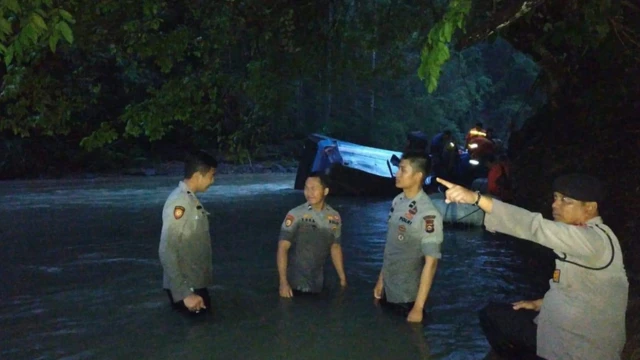 Police inside river