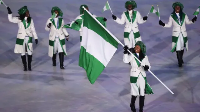 Awọn oludije lati Naijira n yan pẹlu asia orilẹede Naijiria