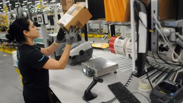 Worker in an Amazon fulfilment centre