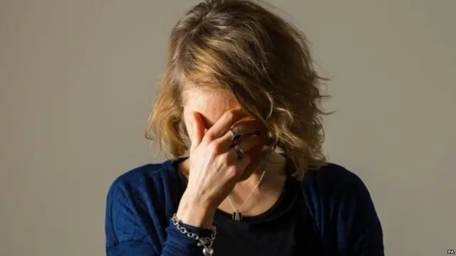 ઉદાસ મહિલાની પ્રતિકાત્મક તસવીર