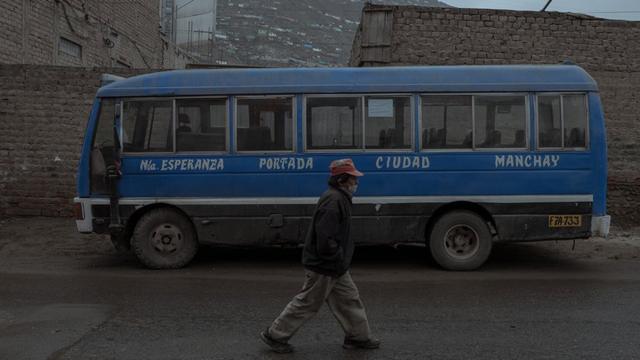 Stop "Nueva Esperanza" (marked on the bus) in Villa Maria del Triunfo, a neighborhood that suffered one of the highest rates of extreme poverty and family violence during the state of emergency imposed in Peru to stop the COVID-19 virus.