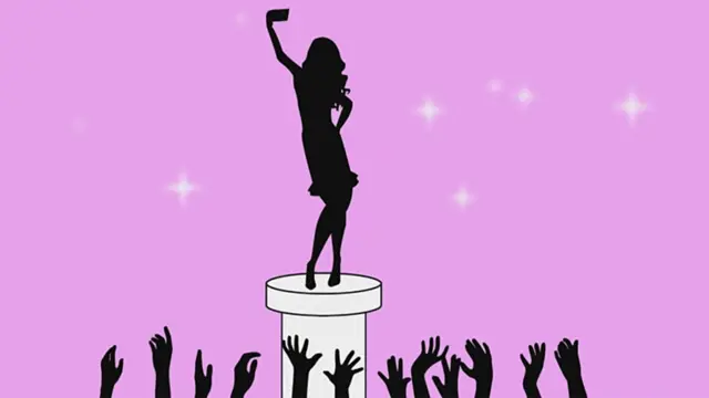 Girl taking a selfie and crowd cheering