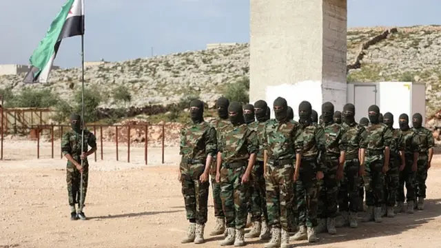 Fighters from the Jaysh al-Izza (the Army of Glory), affiliated with the Turkish-backed Free Syrian Army, take part in a training session in the northwestern Syrian city of Idlib on April 9, 2018.