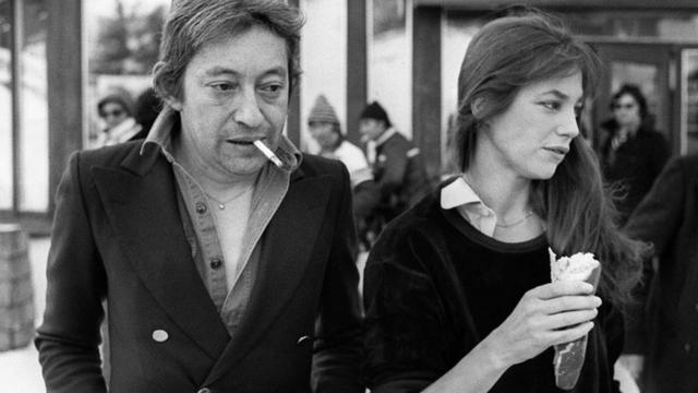 French music great Serge Gainsbourg pictured smoking with his wife Jane Birkin