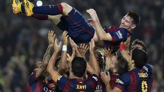 Lionel Messi is given bumps after breaking Barcelona's goalscoring record