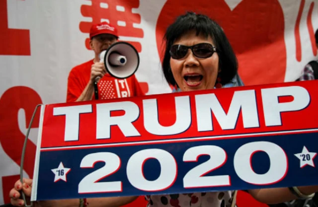 A small group of activists rally in support of U.S. President Donald Trump across the street from Trump Tower on 5th Avenue, June 18, 2019 in New York City