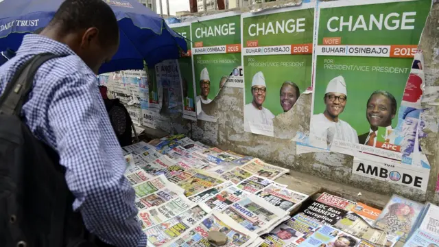 man wey dey read newspaper