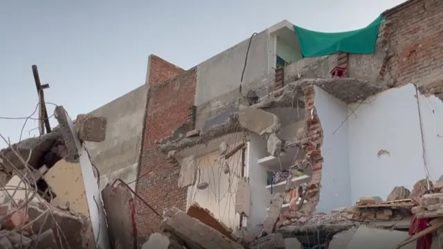 जावेद मोहम्मद का घर ढहाने के बाद की तस्वीर