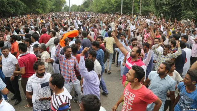AUGUST 25: Dera followers gather to protest after the Dera chief verdict at CBI court on August 25, 2017 in Panchkula