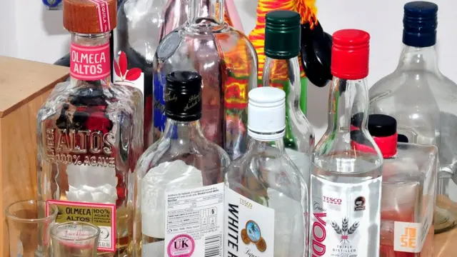 Bottles of alchohol in Reynhard Sinaga's flat