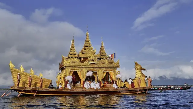 A royal barge on which four Buddha images are are carried. is towed during the Phaung-daw-oo Pagoda Festival in Inle Lake in Shan State. eastern Myanmar
