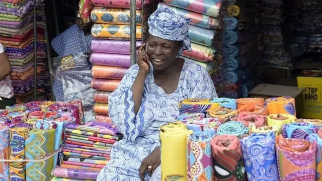 Woman wey dey sell lace