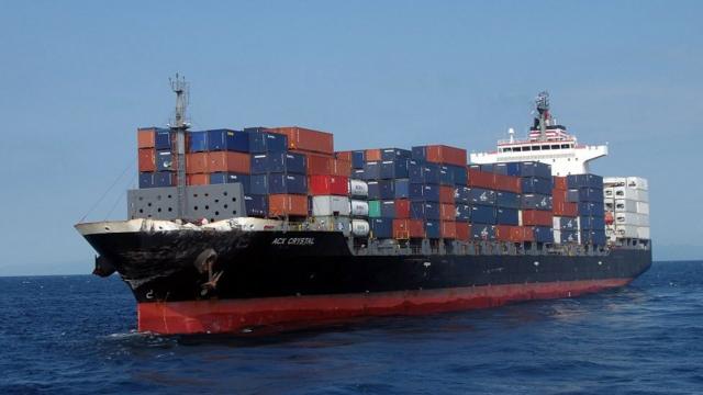 A handout photo made available by the 3rd Regional Coast Guard Headquarters shows the damaged container ship ACX Crystal