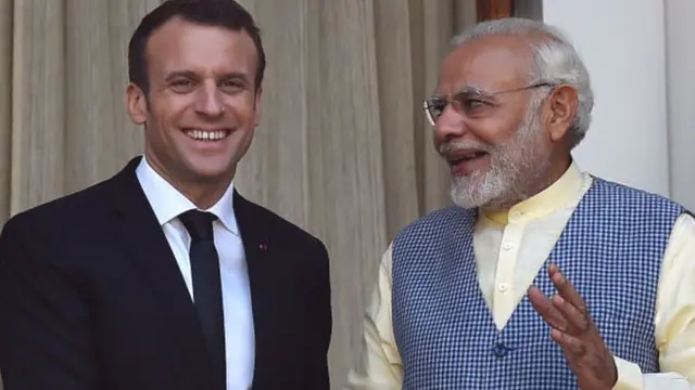 મૈક્રૉં તથા વડાપ્રધાન મોદીની તસવીર