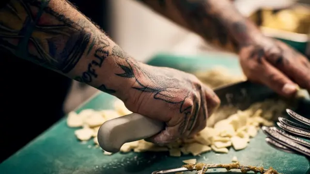 Cozinheiro tatuado