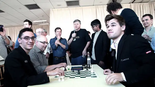 Caruana and Carlsen at a charity event