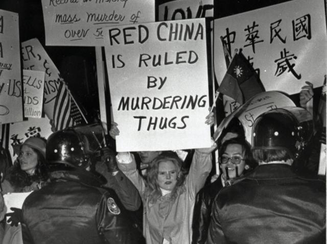 (Original Caption) 2/1/1979-Atlanta, GA: Pro-Taiwan protesters are kept back as they demonstrate in front of the Georia Governor's mansion where chinese Vice Preemier Teng Hsiao-ping was having dinnerwith Gov. Busbee. Seeveral hundred of the demonstrators assembledoutside the mansion after marching there.