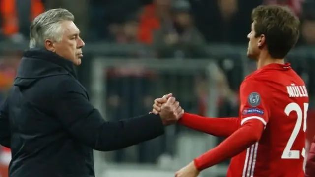 Carlo Ancelotti (left) and Thomas Muller