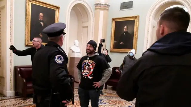 Сторонник теории QAnon в Капитолии