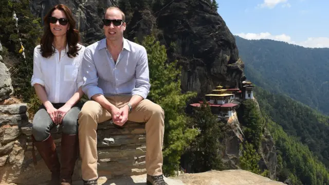 Duke and Duchess of Cambridge sit overlooking the Tiger's Nest monastery in Bhutan on 15 April 2016