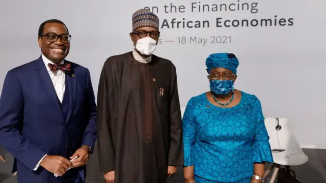 Nigeria presient Muhammadu Buhari wit WTO Director-general Ngozi Okonjo-Iweala and Dr Akinwumi Adesina,President of di African Development Bank