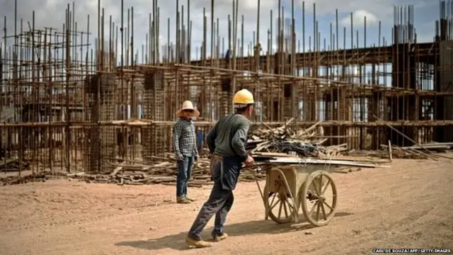Pictured in 2015, Chinese workers build railway infrastructure to link Djibouti with Addis Ababa, in neighbouring Ethiopia