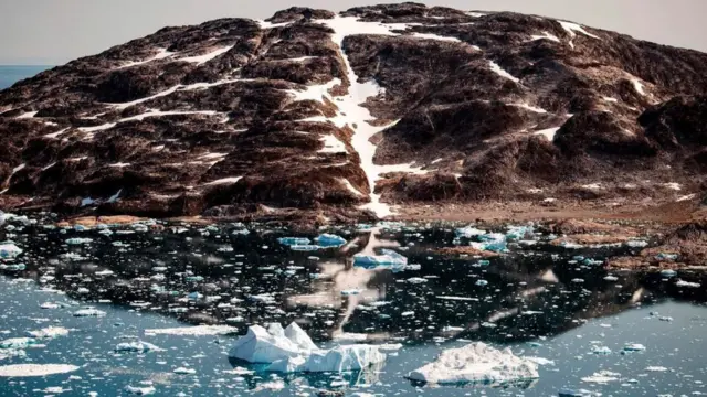 A glacier releasing water