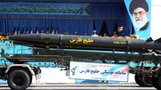 A military truck carries the long-range 'Khalij Fars (Persian Gulf)', a supersonic, anti-ship ballistic missile during an annual military parade which marks Iran's eight-year war with Iraq, in the capital Tehran