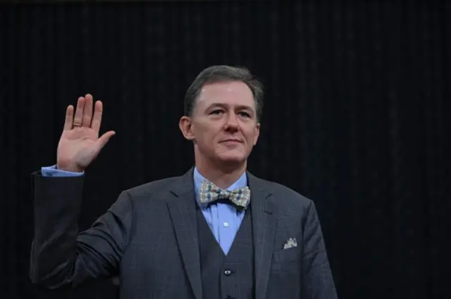 ကြားနာမှု အစမှာ ဂျော့်ချ်ကန့် ကျမ်းကျိန်ဆိုစဉ်