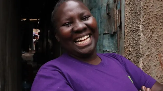 Milicent Kagonga akitabasamu