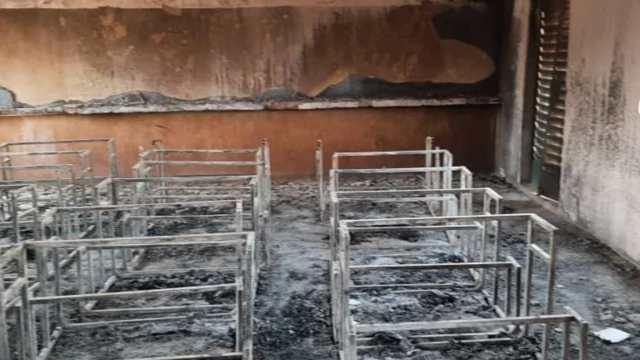 The scene at the school in Niger show remains of desks - Wednesday 14 April 2021