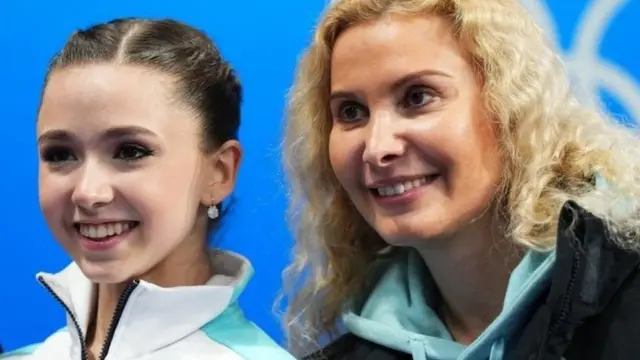 பயிற்சியாளருடன் வலீவா