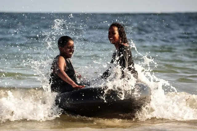 Children play at Jazera beach where now becomes a popular spot on the outskirts of Mogadishu, Somalia, on November, 24, 2017.