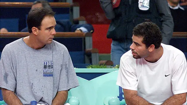 آناکون در ۹ گرنداسلم از ۱۴ گرنداسلمی که سمپراس قهرمان شد، مربیاش بود