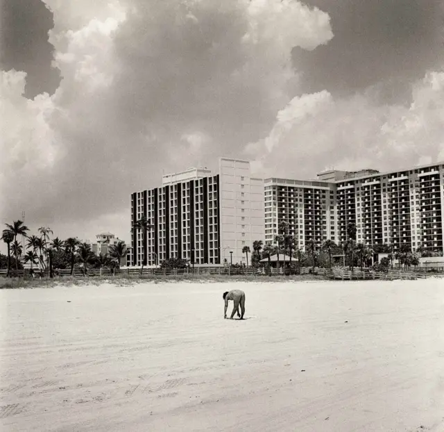 A person exercises on Miami Beach