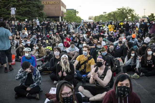 19. Demonstrators during protests resulting from the killing of an unarmed black man, George Floyd, by police.