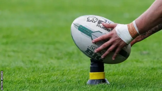 Rugby league ball on a kicking tee